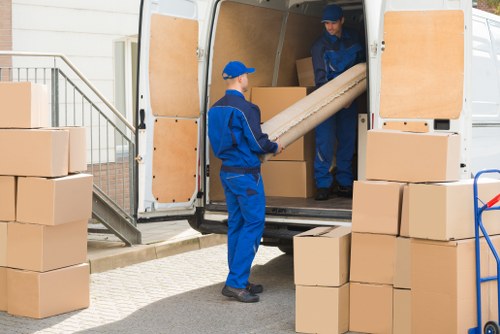 Professional removals team handling a house move in Plumstead