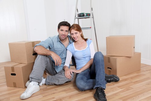 Careful wrapping of fragile items before a Plumstead flat move