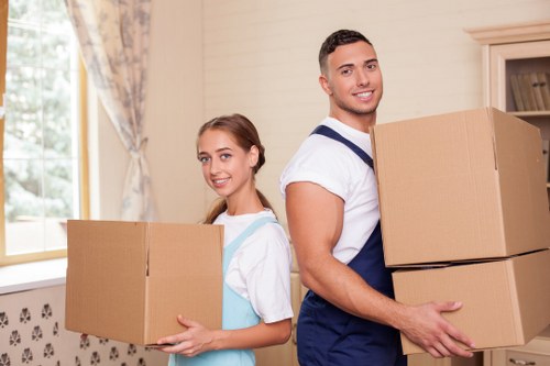 Organized storage boxes and furniture inside a Plumstead unit