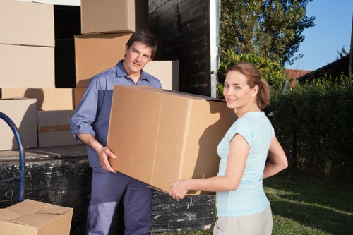 Packing team organizing household items for a move in Plumstead